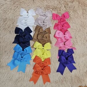 Girls' hair clip bows, solid colors.